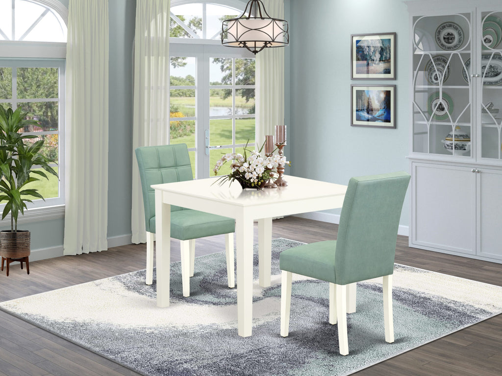 East West Furniture OXAS3-LWH-43 3 Piece Mid Century Modern Dining Set contain A Dinning Table and Willow Green Faux Leather 2 Dining Room Chairs, Linen White