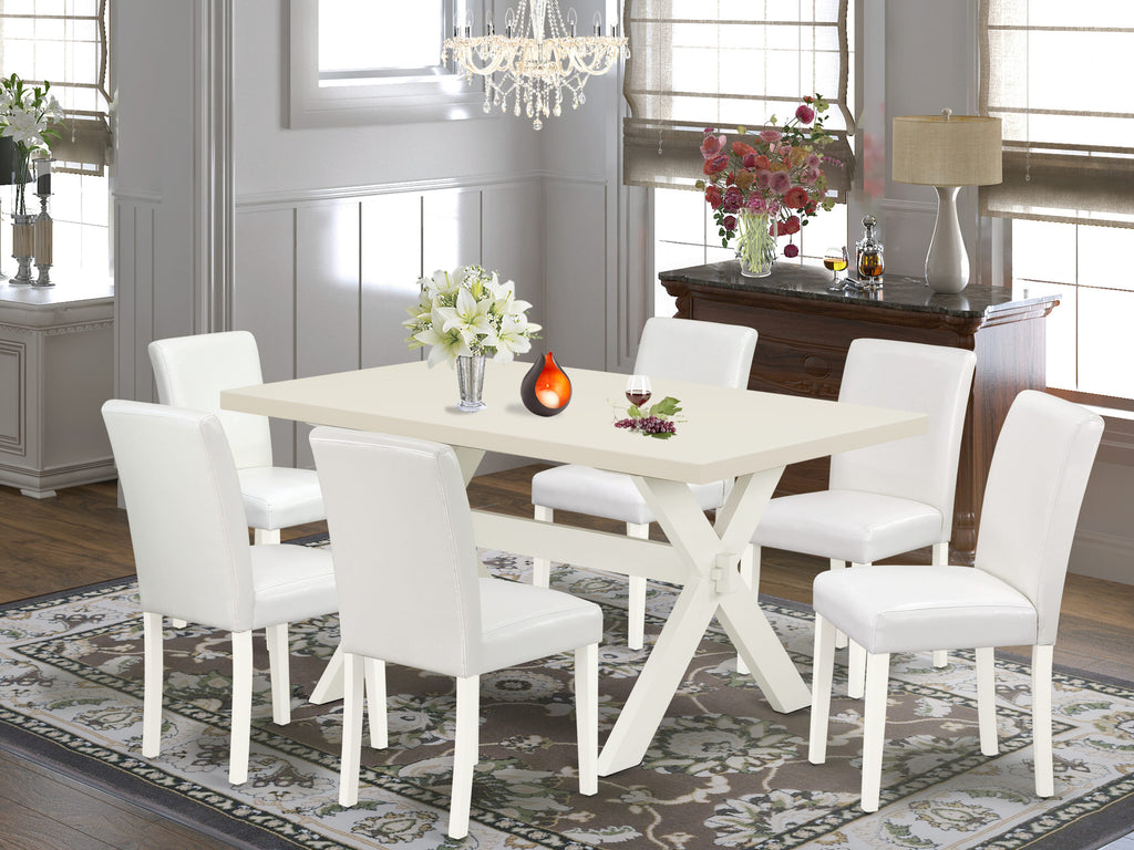 East West Furniture X026AB264-7 7 Piece Kitchen Table Set Consist of a Rectangle Dining Table with X-Legs and 6 White Faux Leather Parsons Dining Chairs