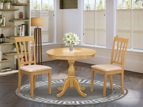 East West Furniture AMAN3-OAK-C 3 Piece Modern Dining Table Set Contains a Round Kitchen Table with Pedestal and 2 Linen Fabric Dining Room Chairs, 36x36 Inch, Oak