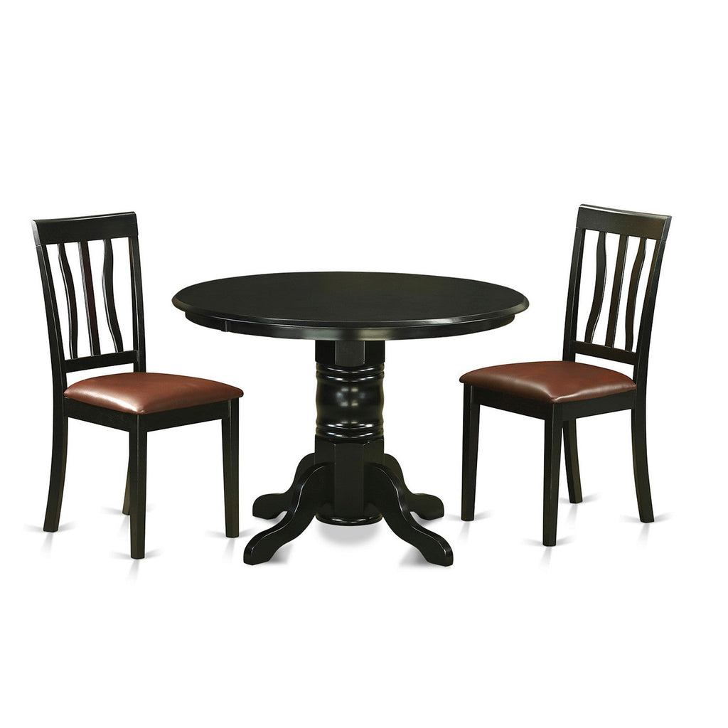 East West Furniture SHAN3-BLK-LC 3 Piece Dining Set Contains a Round Dining Room Table with Pedestal and 2 Faux Leather Upholstered Chairs, 42x42 Inch, Black